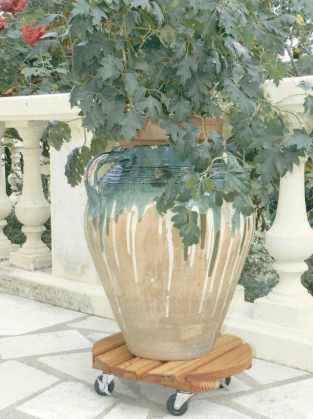 Soporte rodante de madera redondo FLORA ROLL LASURE Nortene