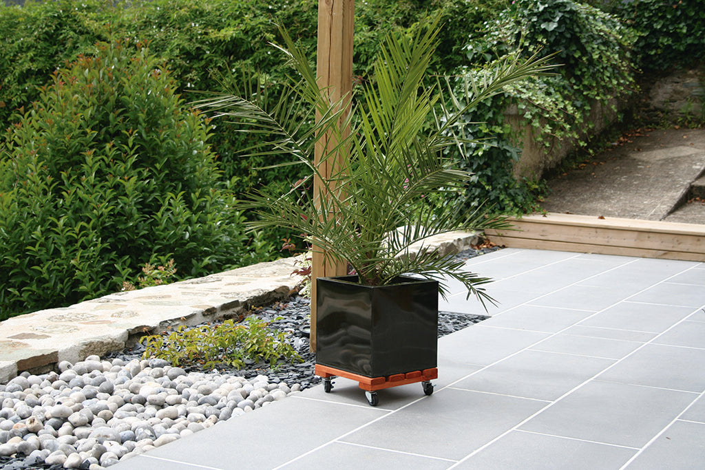 Soporte rodante de madera redondo FLORA ROLL LASURE Nortene
