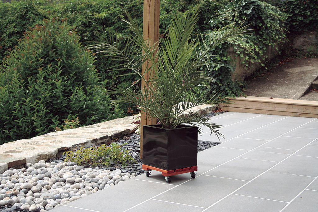 Soporte rodante de madera redondo FLORA ROLL LASURE Nortene